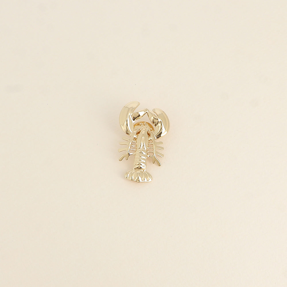 Pin's HOMARD doré