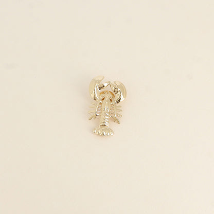 Pin's HOMARD doré